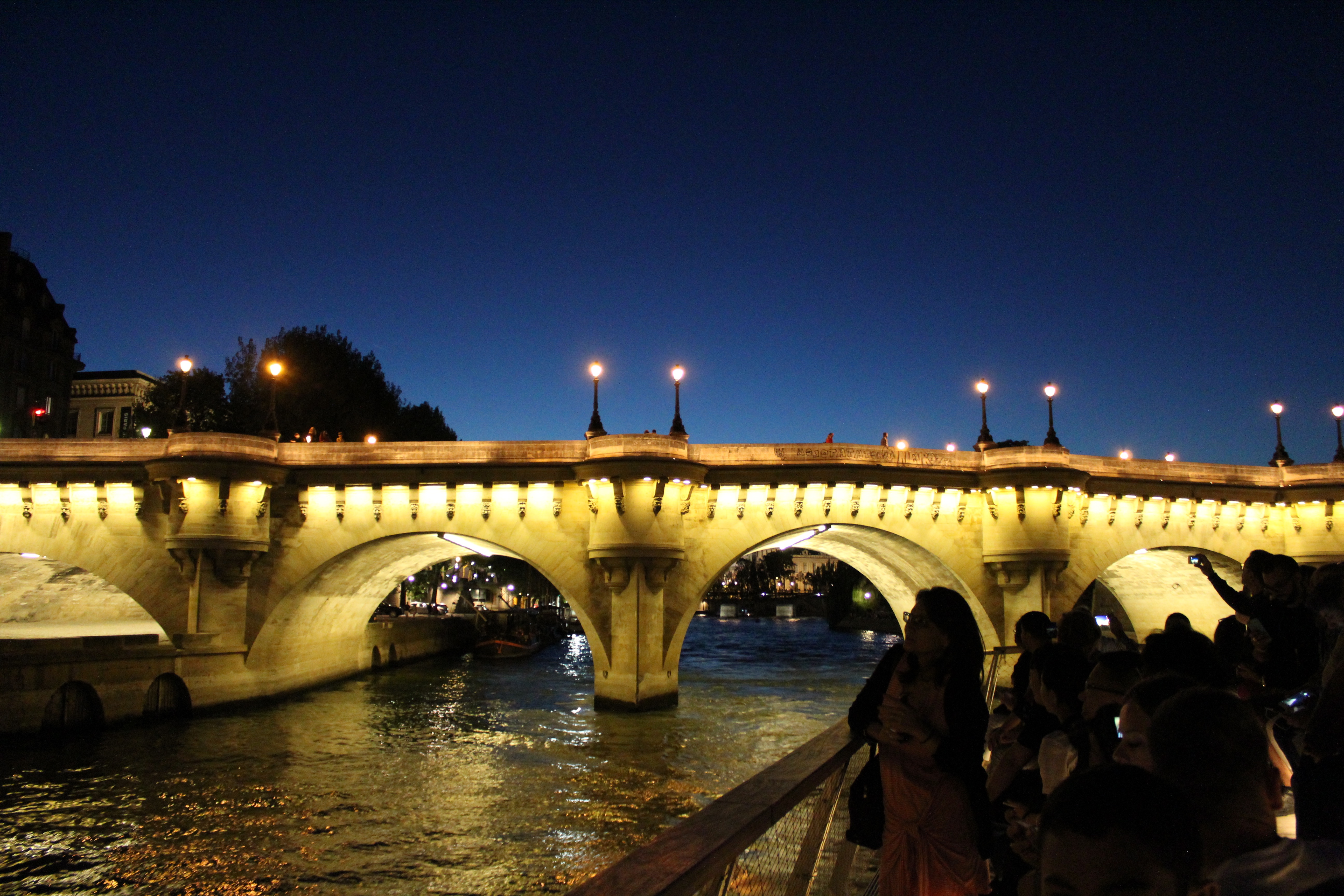 Paris bridge at night with beautiful lights
